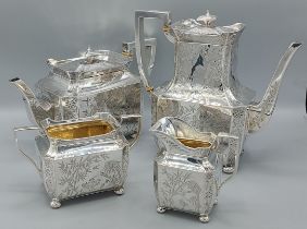 A Victorian silver four piece tea service comprising teapot, hot water pot, two handled sucrier