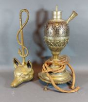 A brass door stop in the form of a foxes head, togther with an engraved decorated Hookah base