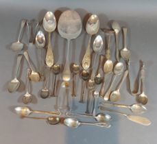A London silver serving slice by Asprey, together with a pair of Sheffield silver spoons and a