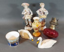 A Royal Worcester blush ivory small vase, together with two Beswick models of swans, a Royal