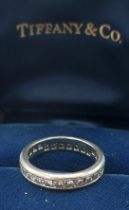 A Tiffany and Co. Lucida Platinum and Diamond set full Eternity ring with ring box and outer box,