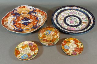 A Japanese satsuma small bowl decorated with flowers, together with two matching plates and two