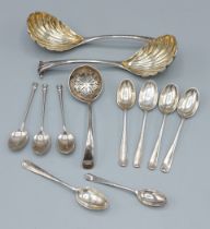 A pair of William IV silver ladles, London 1837 together with various silver tea and coffee spoons