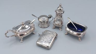 A Birmingham silver Vesta case together with a set of three Birmingham silver condiments and a