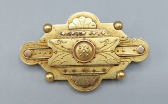 A late Victorian yellow metal brooch/locket of shaped form, 10.4gms