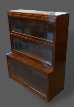 A Globe Wernicke oak three section bookcase with three glazed doors, base missing, 86cms wide by