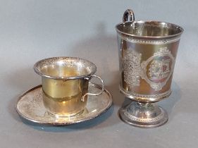 A Victorian silver christening mug, London 1875 together with a Birmingham silver cup and saucer,