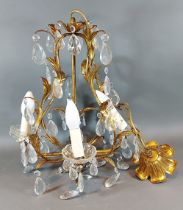 A gilded metal and cut glass four branch light fitting, 42cms long