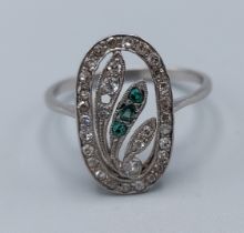 A white metal dress ring set with Diamonds within a pierced setting, (one stone missing), 3.3gms,