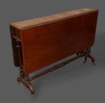 A Victorian mahogany large Sutherland table, the rectangular drop flap top raised upon turned end