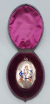 A Victorian silver oval large locket enamel decorated with initials within in fitted lined case