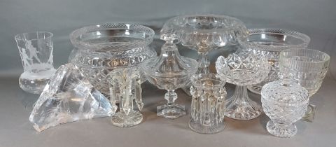 A glass comport together with other glassware to include two lustres