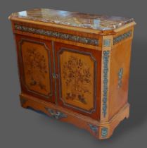 A French inlaid and gilt metal mounted commode, the variegated marble top above two inlaid doors