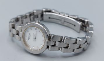 A stainless steel cased ladies wristwatch by Raymond Weil, the M.O.P. dial set with Diamond markers,