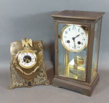 An Edwardian Library clock, the enamel dial with Arabic numerals and two train movement together