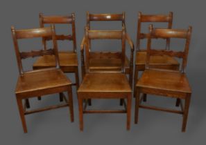 A set of six 19th Century oak farmhouse dining chairs, each with carved rail backs above panel seats