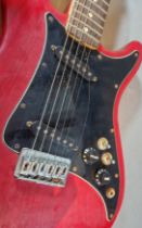 A circa 1980's Fender Lead II electric guitar, with wine red body, made in USA, serial number