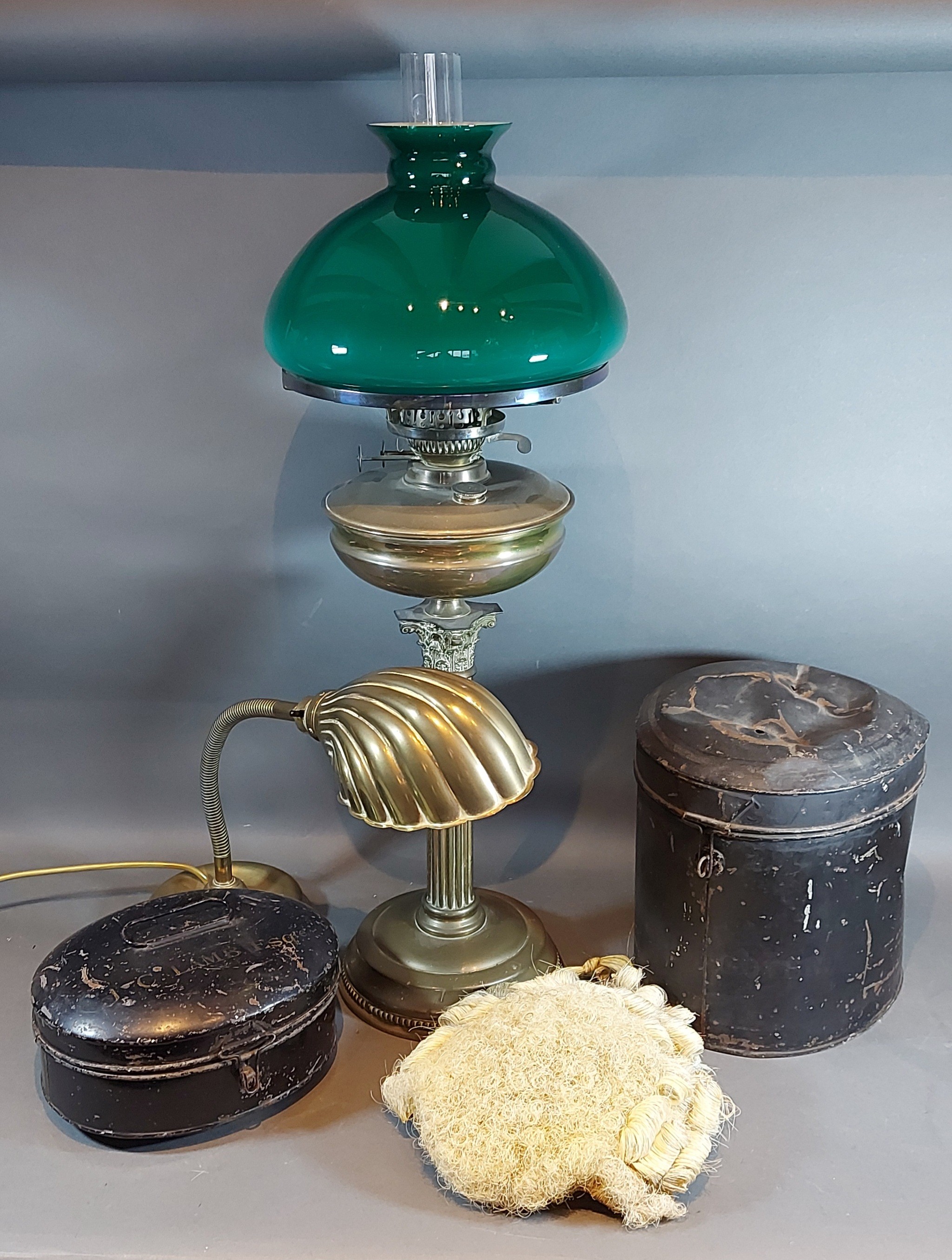 A 19th Century barristers wig within metal box, together with another wig box, a brass oil lamp with