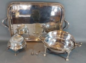 A silver plated rectangular tray with side handles, together with other silver plated items