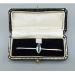 A 15ct gold bar brooch set with a Marquise Aquamarine