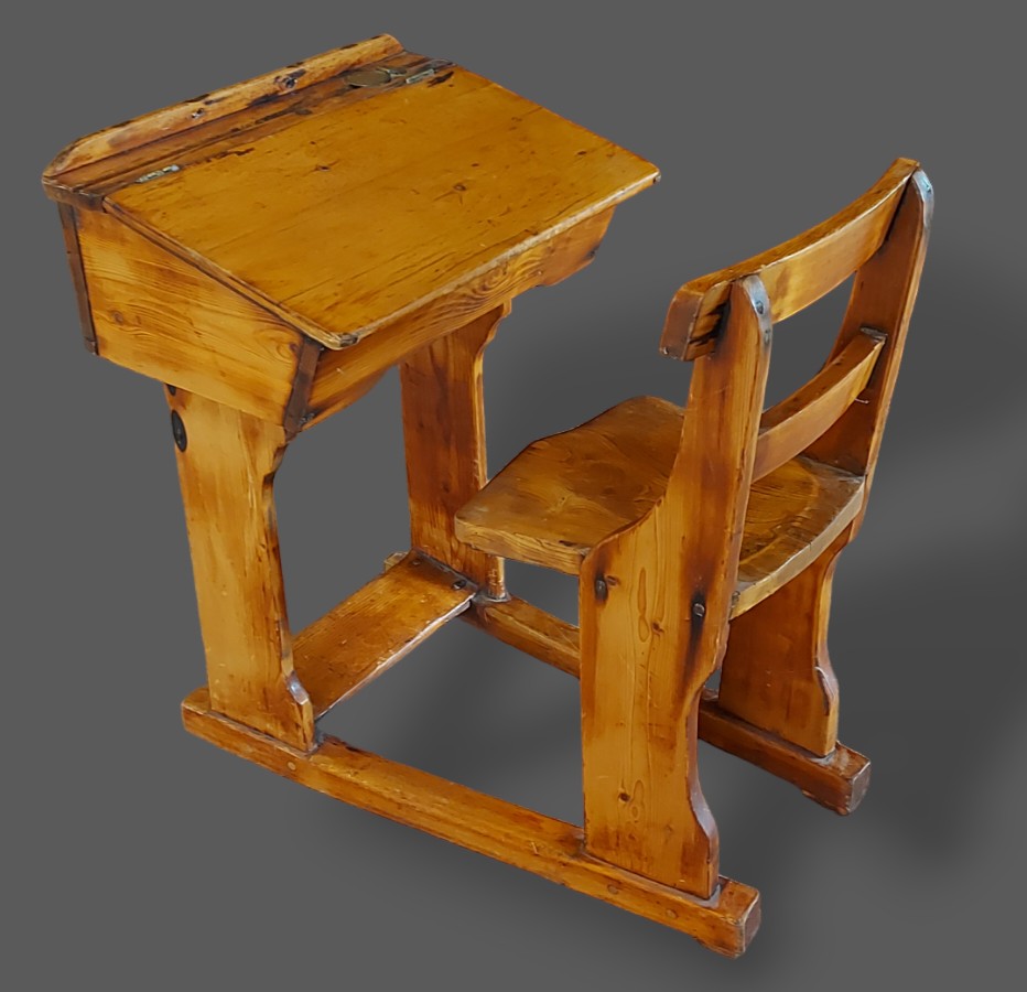 A Victorian pine and elm child's school desk and chair by Geo. M. Hammer & Co, The Strand, London,