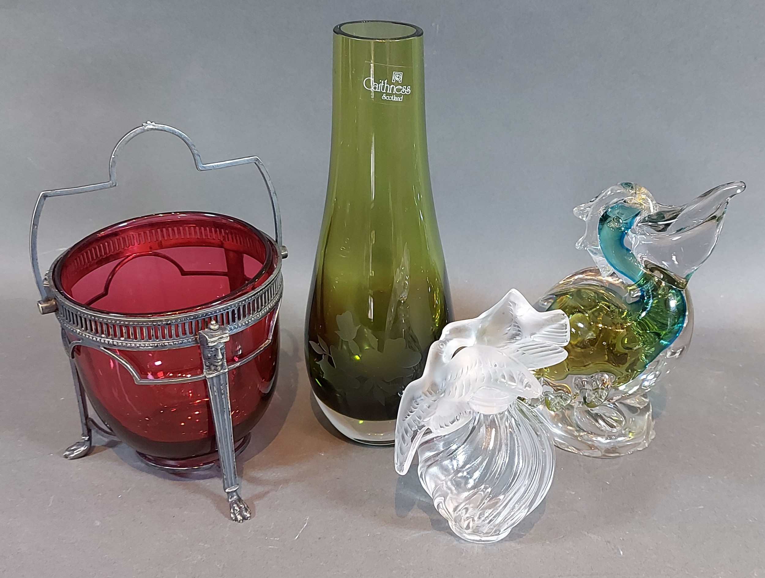 A Lalique glass perfume bottle for Nina Ricci, decorated with doves together with a Murano glass