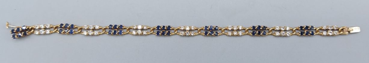 An 18ct gold Sapphire and Diamond set bracelet of linked form, 9.7gms, 16cms long