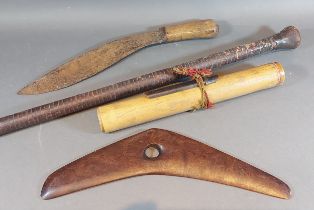An early Boomerang together with blow pipe and darts and Khukri knife