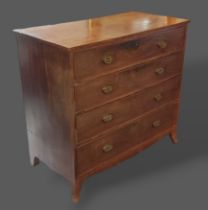A 19th Century Mahogany Chest of four long drawers with oval brass handles, raised upon outswept