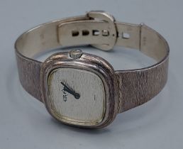Roy King, a silver cased wristwatch with silver strap