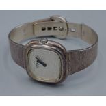 Roy King, a silver cased wristwatch with silver strap