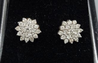 A pair of 18ct gold Diamond cluster earstuds