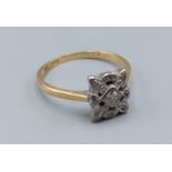 An 18ct gold Diamond cluster ring of square form, 3.1gms, ring size Q