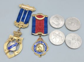 A silver gilt and enamel masonic jewel, together with another similar jewel and four crowns