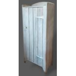 A painted pine cupboard with a single door, 76cms wide, 40cms deep and 182cms tall