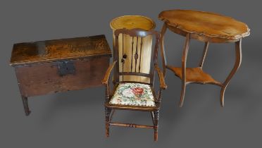 An 18th Century small oak coffer together with a circular pine cupboard, an occasional table and a