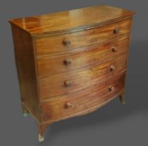 A 19th Century Mahogany Bow Fronted Chest of four long graduated drawers with knob handles raised