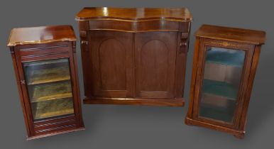 A Victorian inlaid music cabinet together with another mahogany music cabinet and a mahogany