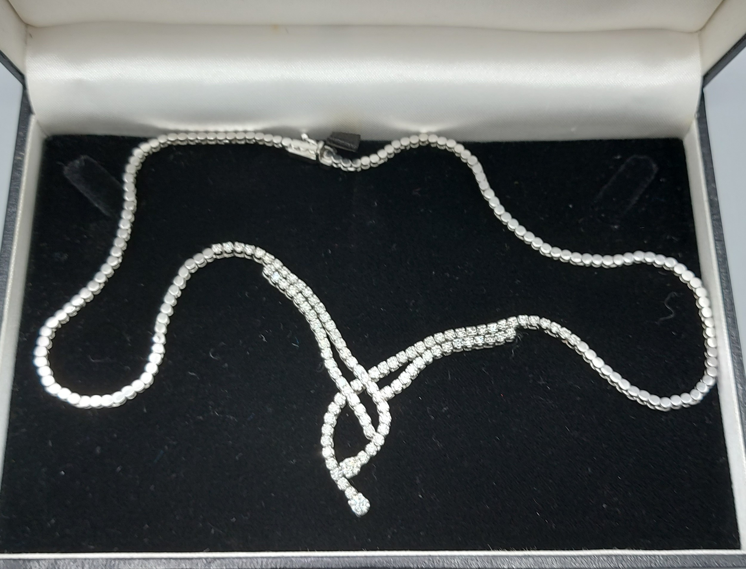 An 18ct white gold Diamond set necklace of interwoven linked form, 28gms, 41cms long - Image 2 of 2