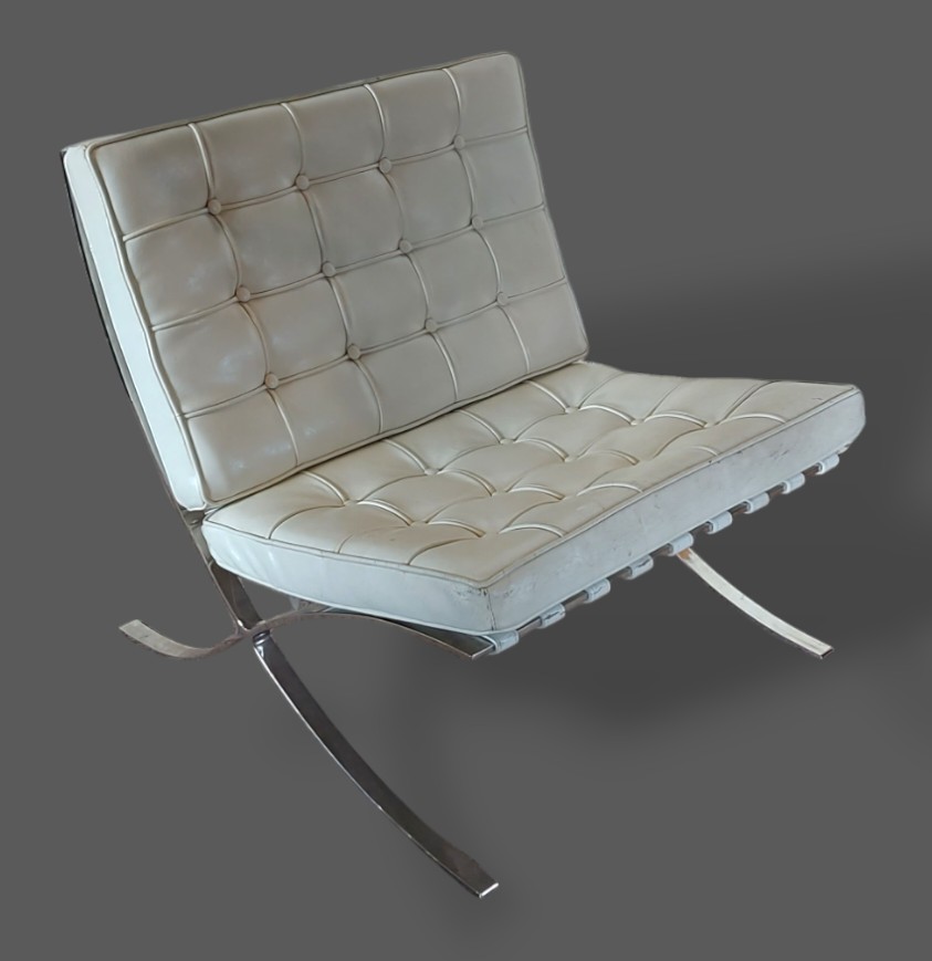 In the style of Ludwig Mies Van Der Rohe for Knoll a chrome and leather upholstered chair