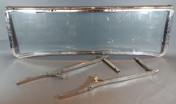 A Lea - Francis chrome and glass windscreen, K or P type with chrome mounting brackets, 101cms wide
