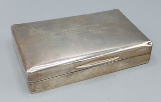 A London silver cigarette box of rectangular form, 14.5cms long