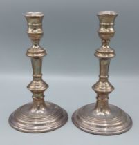 A pair of London silver candlesticks in the 18th Century style, 20.5cms tall