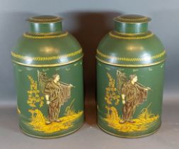 A pair of Toleware covered cannisters, each gilded with figures upon a green ground, 36cms tall