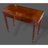A 19th Century mahogany tea table, the hinged top above turned legs