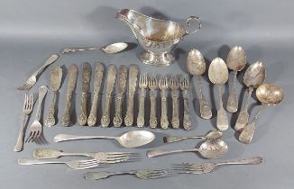 A collection of plated flatware together with a plated jug