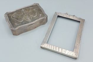 An Edwardian silver pique work jewellery casket, London 1908, William Comyns, together with a London