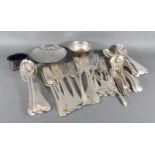 A collection of silver plated flatware together with two bowls and an oval salt