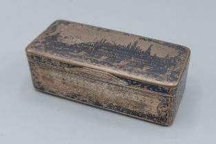 A Russian silver Niello box, the hinged top decorated with a view of Moscow, 8cms wide,