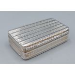 A George IV silver snuff box of ribbed form, with silver gilt interior, Birmingham 1830, maker